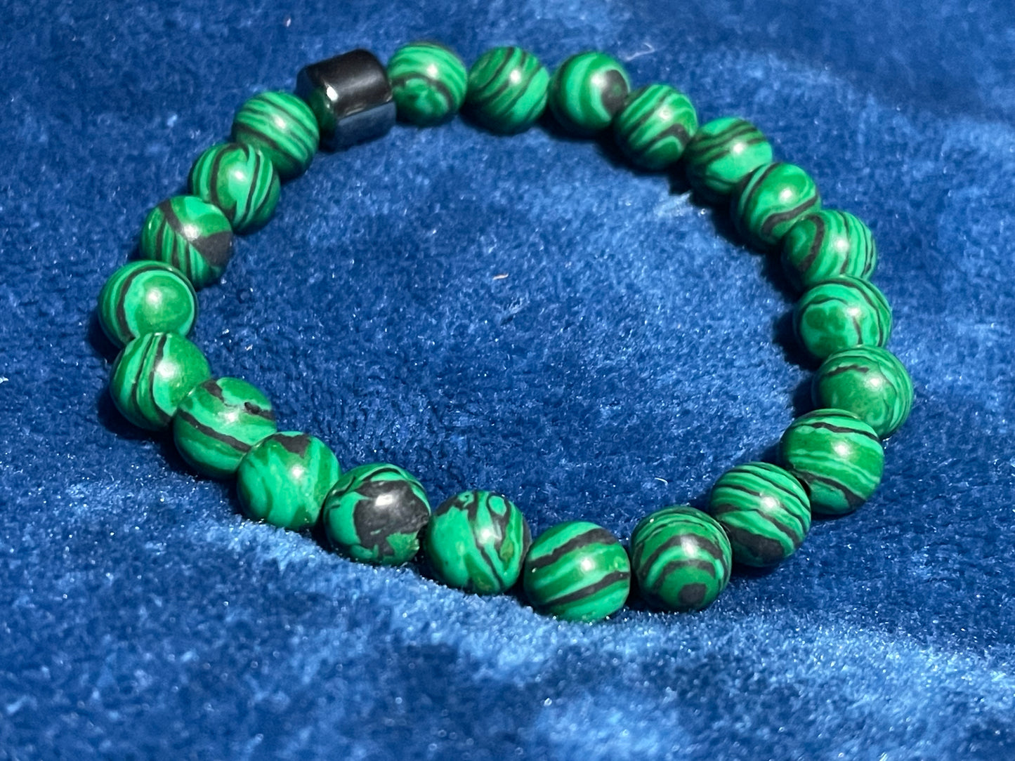 Green Malachite 8mm Round Bead Bracelet with a Black Hematite Bead