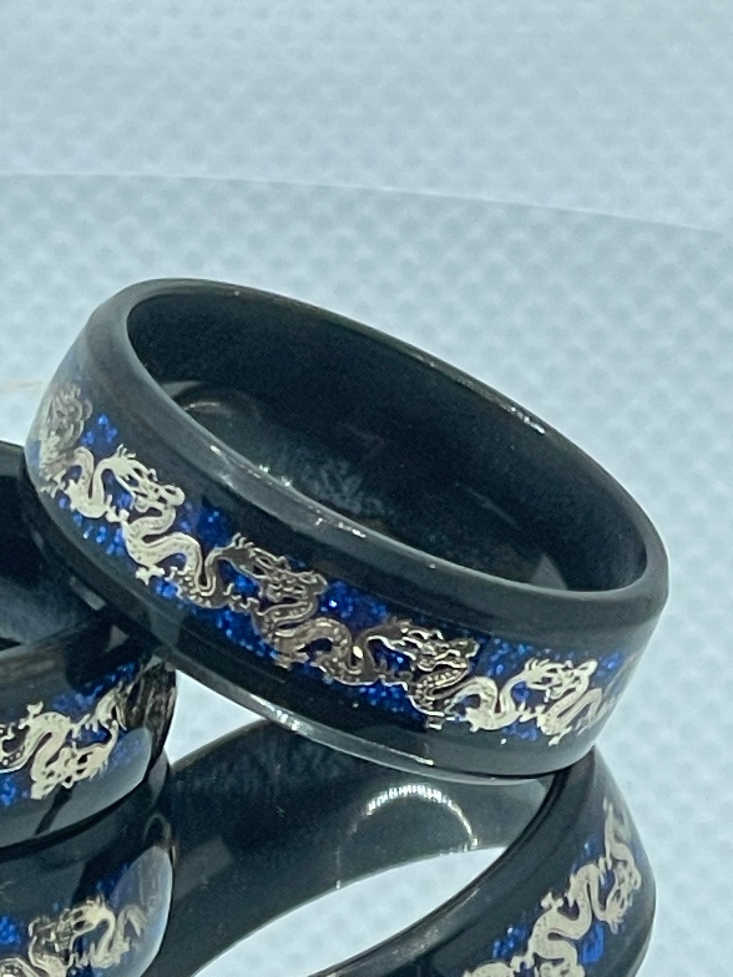 8mm Black Stainless Steel Ring Gold Dragon Detail on Glittery Blue Band