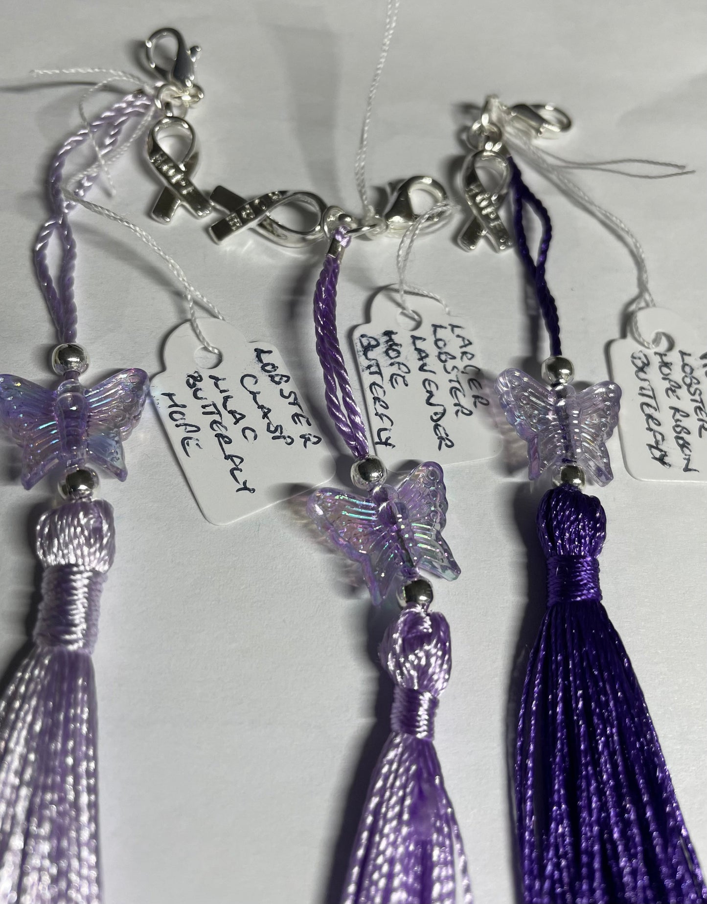 Purple (non-specific) Medical Condition Awareness Charms Tassels with Angels and/or Butterflies with Lobster Clasps