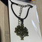 Tree of Life Pendants suspended from various necklaces