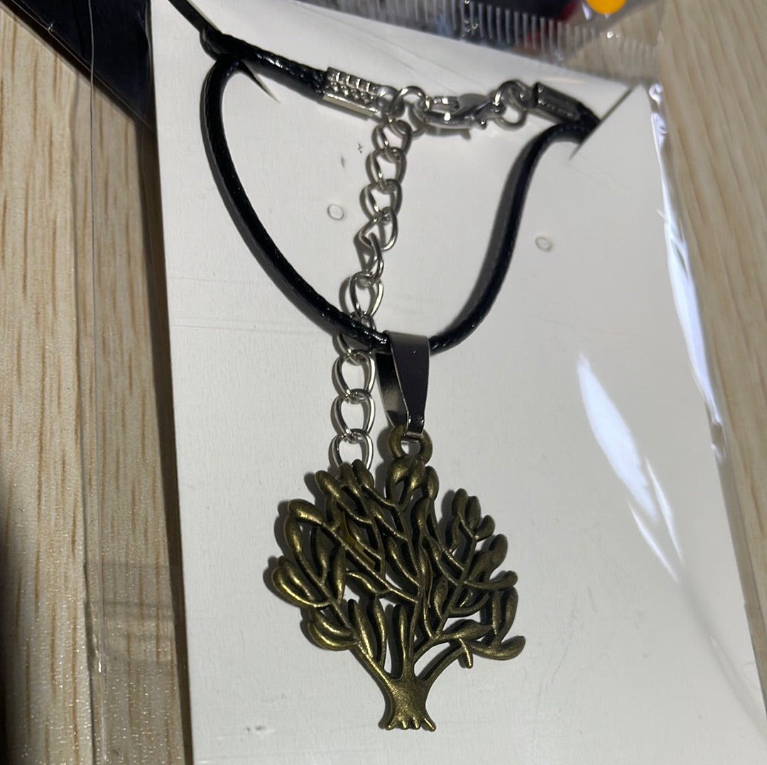 Tree of Life Pendants suspended from various necklaces